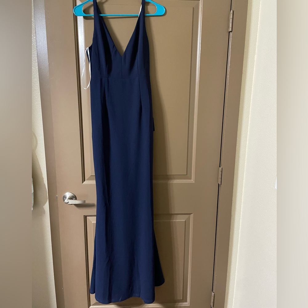 Lulu’s full length maxi dress in Navy Blue. Deep V neck back. Size small.